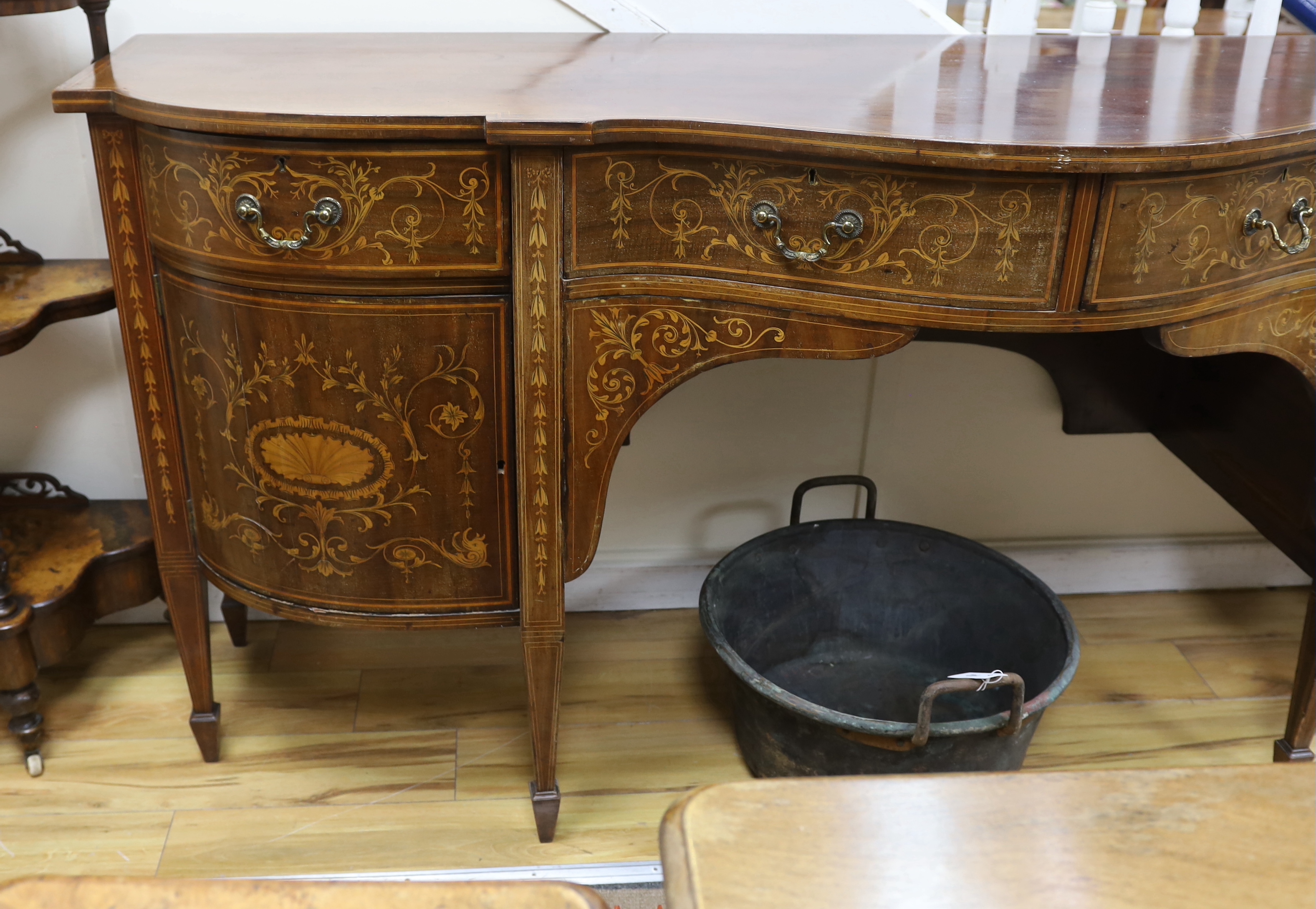 An Edwardian marquetry inlaid mahogany bow front sideboard, width 215cm, depth 73cm, height 95cm